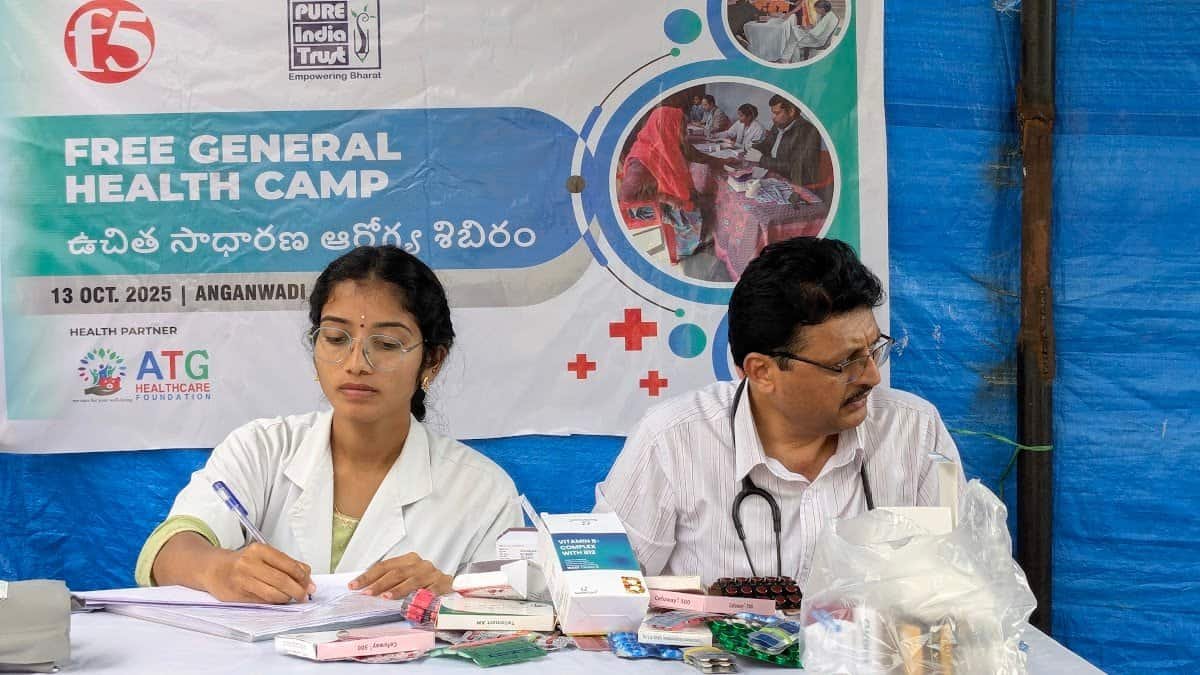 A doctor and a nurse examining patients at an ATG free general health camp